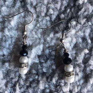 Black and white dangly earrings